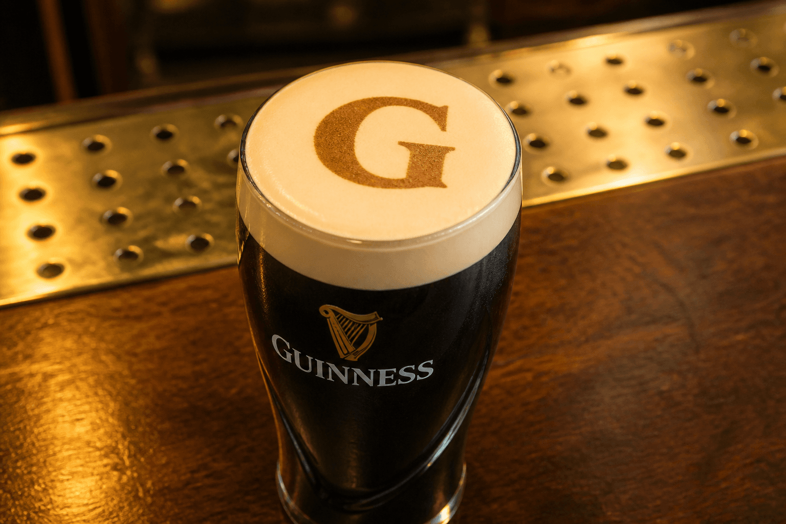 Brand logo on Guinness foam